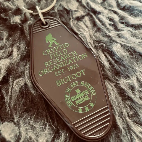 The 3 Sisters Design Co. Motel Key Fob - Cryptid Field Research Org. (Bigfoot)