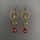 Mio Queena Dragon & Hand Dangle Earrings