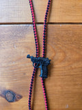 Reds Retro Pistol with Red and Black Leather Bolo Tie