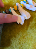 Unforgiven Cow Teeth Tiki Pendant Necklace in teal