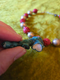 Unforgiven Cinnabar and Teal Coral Tiki Necklace