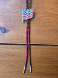 Unforgiven Rhinestone American Flag Red Bolo Tie