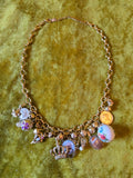 Unforgiven Gold Religious Charm Necklace with bells
