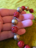 Unforgiven Cinnabar and Teal Coral Tiki Necklace