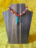 Unforgiven Cinnabar and Teal Coral Tiki Necklace