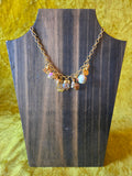 Unforgiven Gold Religious Charm Necklace with bells